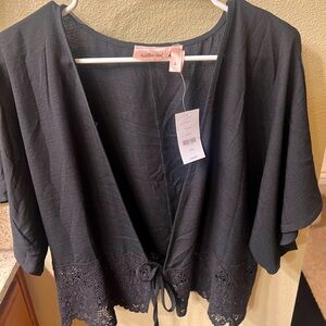 Woman’s black top from Buckle